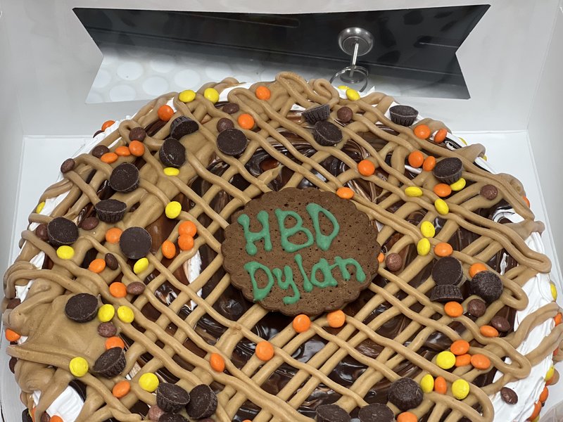Chocolate peanut butter lattice cake with Reese's candy